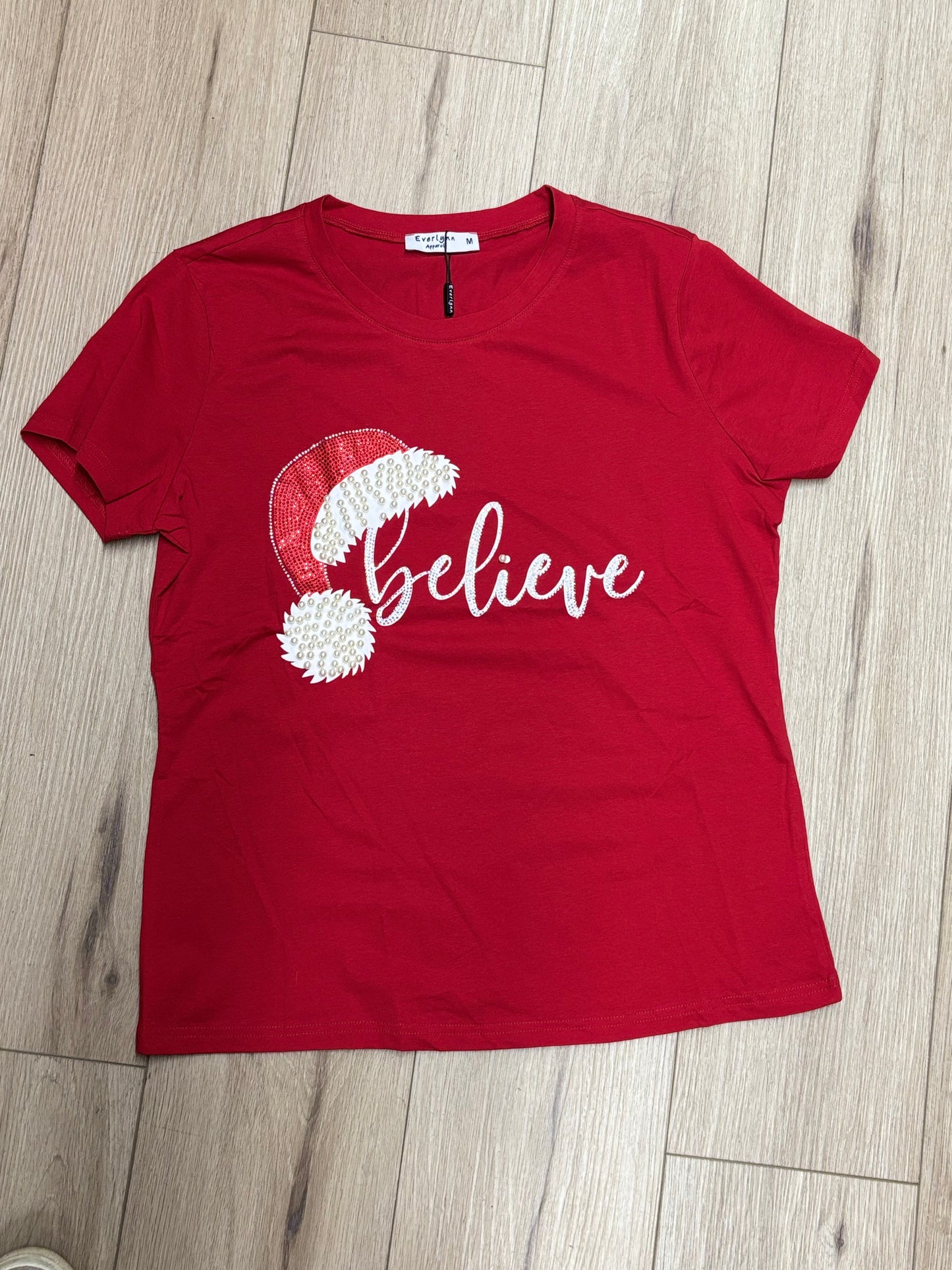 Believe red shirt