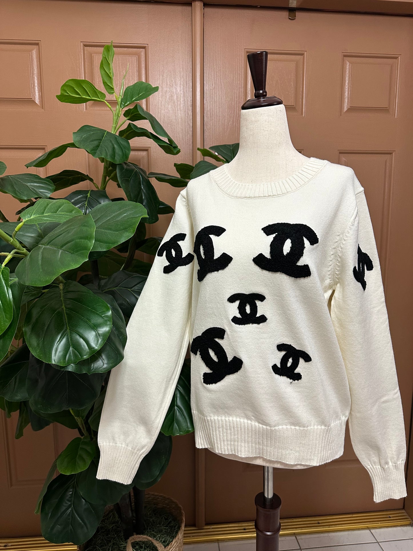 CC white and black sweater