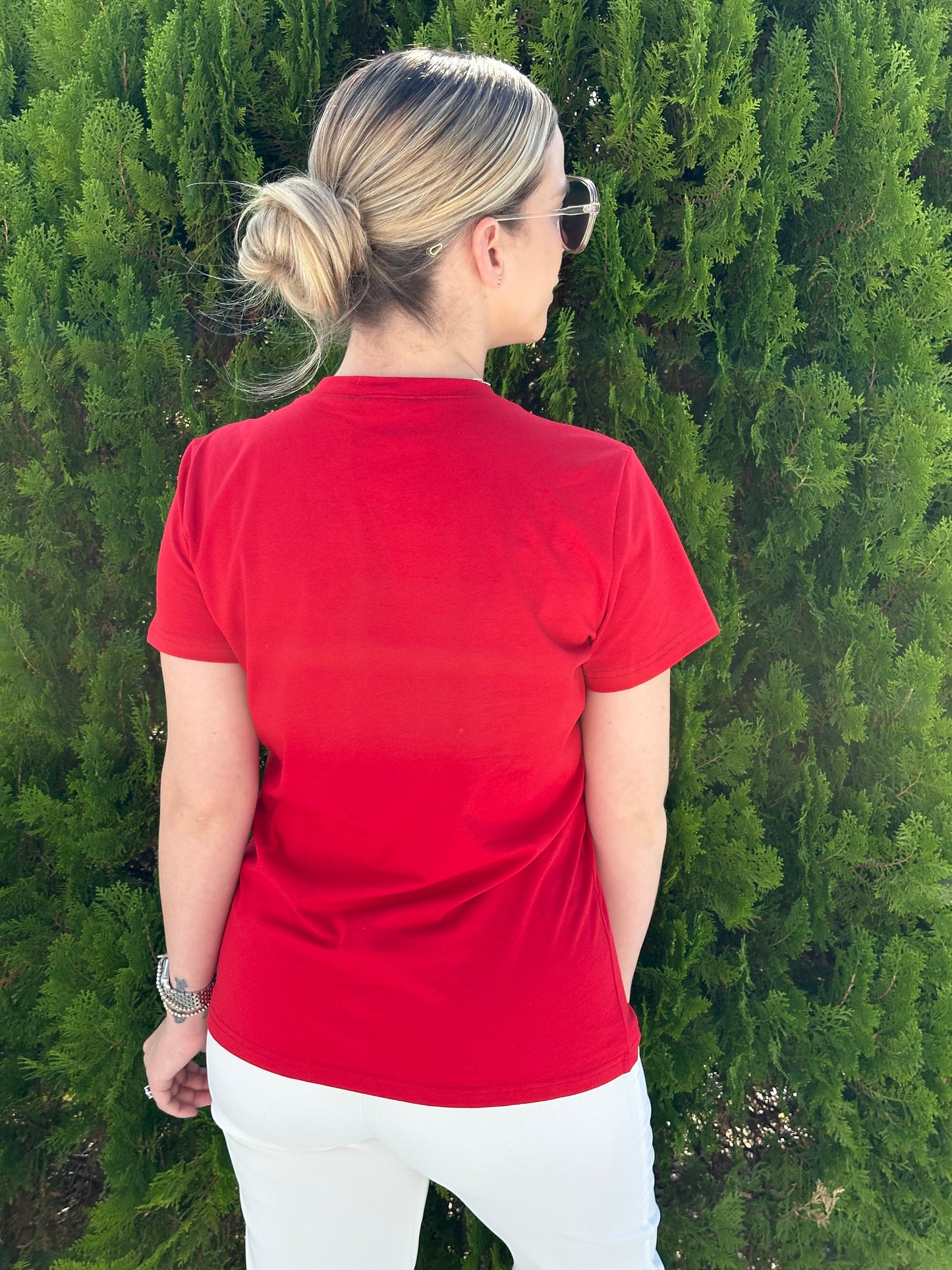 Believe red shirt