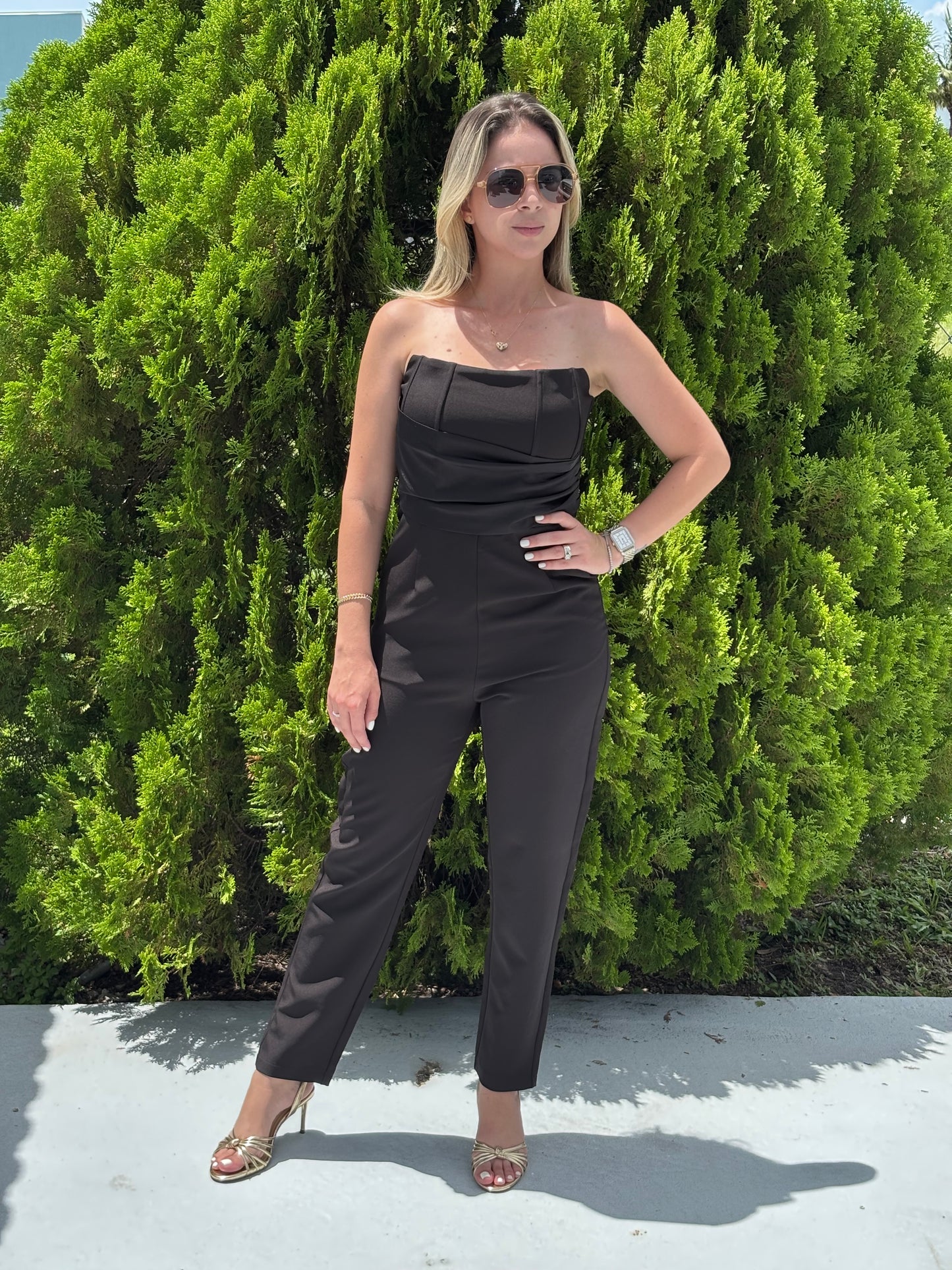 Megan in black jumpsuit
